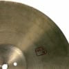 Close-up of Tosco 14-inch hats cymbal with detailed grooves and stamp.