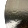 Close-up of a Zildjian K Custom 20in Dark Ride cymbal with water droplets.
