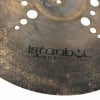 Close-up of Istanbul Xist 21-inch Ion Dark Ride cymbal with logo.