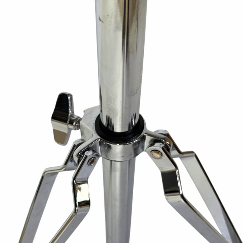 Metal drum stand with adjustable legs for drummers.