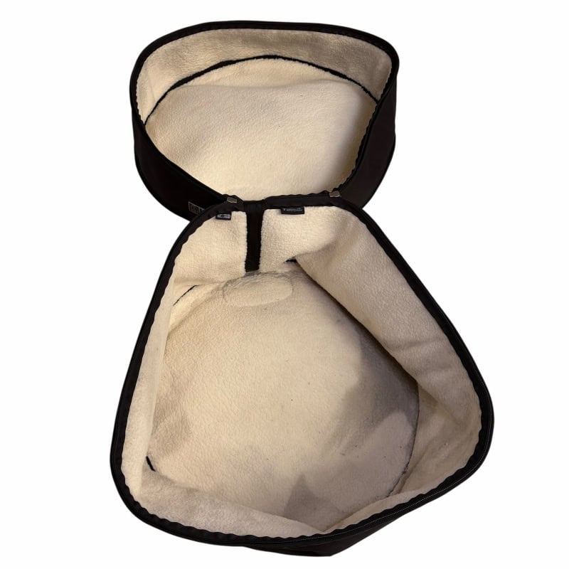 Bass drum case with soft interior padding for protection and transport.