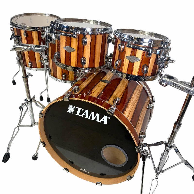 Professional wooden drum set with TAMA bass drum and cymbal stands for drumming enthusiasts.