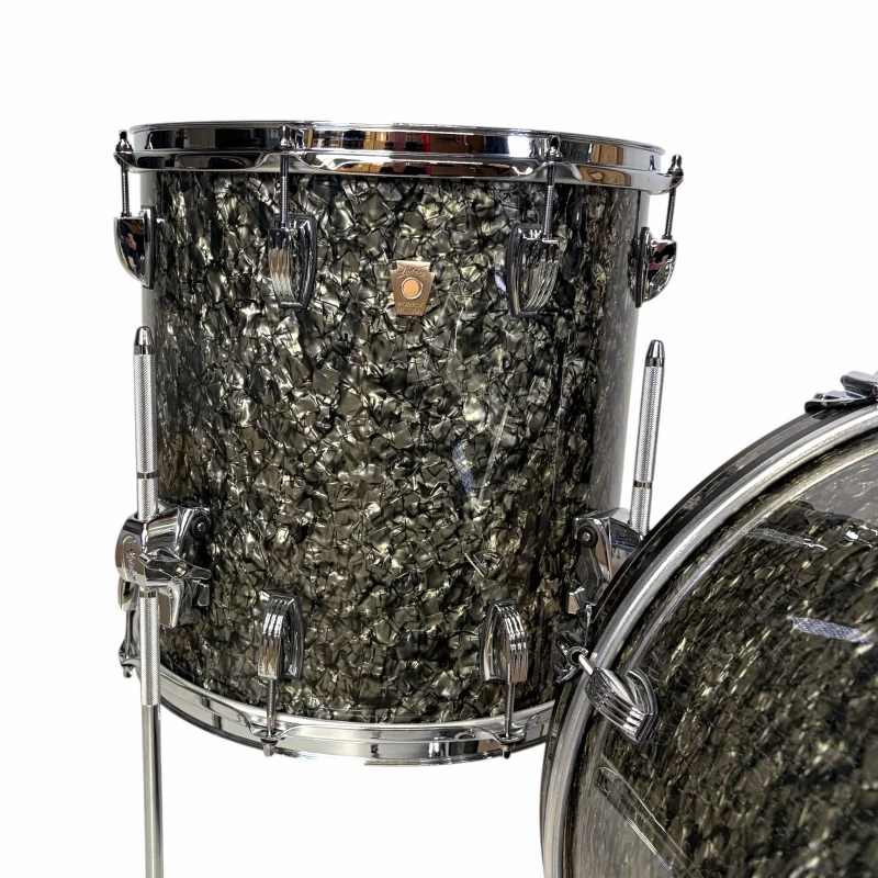 High-quality custom drum kit with a unique black and silver finish.