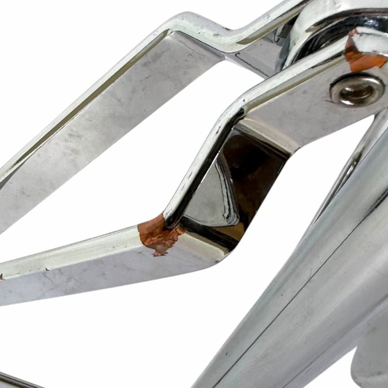 Metal drum hardware with rust details, close-up shot.