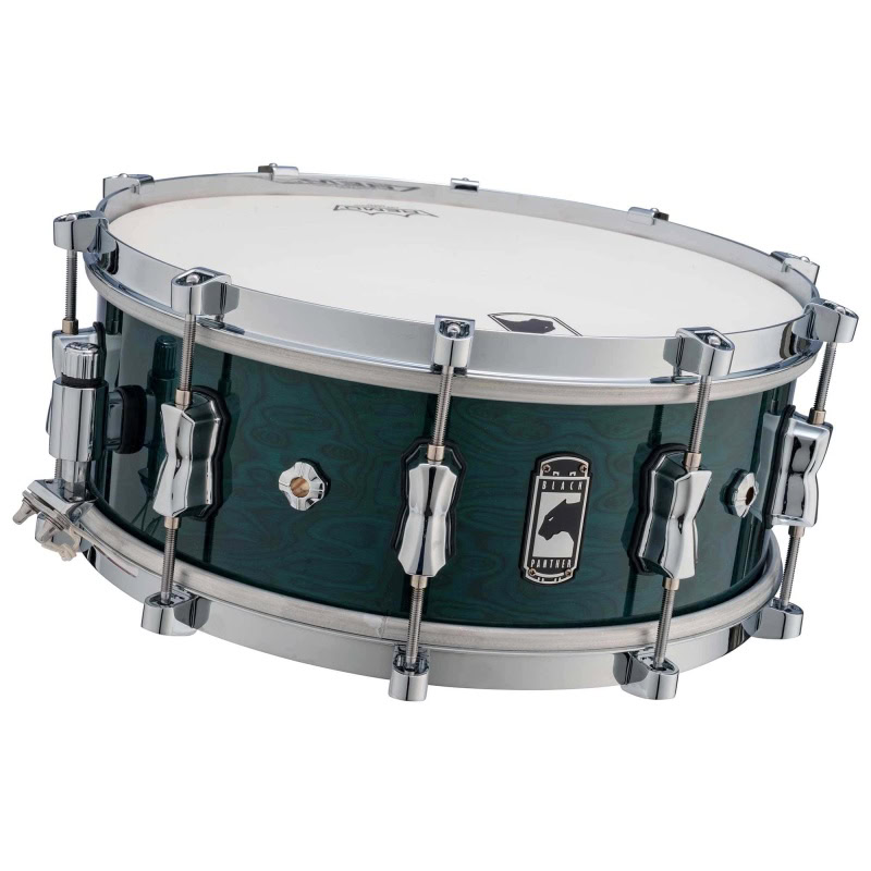 Snare drum with chrome hardware and dark green finish, ideal for professional drummers and percussio.