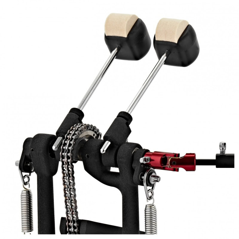 Double bass drum pedal with extended footboard and chain drive for drummers.