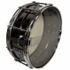 Black steel snare drum with chrome hardware and clear drumhead for drumming enthusiasts.