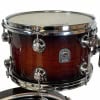 Natal Cafe Racer 20-inch shell pack with rich wood finish and chrome hardware.