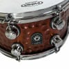Close-up of Natal hammered steel snare drum with chrome hardware.