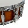 Close-up of Gretsch Catalina snare drum with chrome hardware and wooden shell.