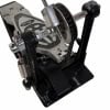Close-up of a bass drum pedal with chain drive and footplate.