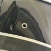 Close-up of a drum pad with a central hole for mounting.