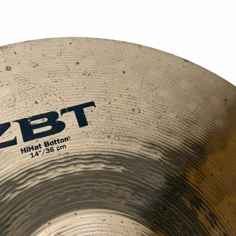 Close-up of Zildjian ZBT 14-inch HiHats cymbals for drumming.