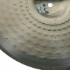Close-up of Zildjian ZBT 14in hi-hat cymbal with textured surface.