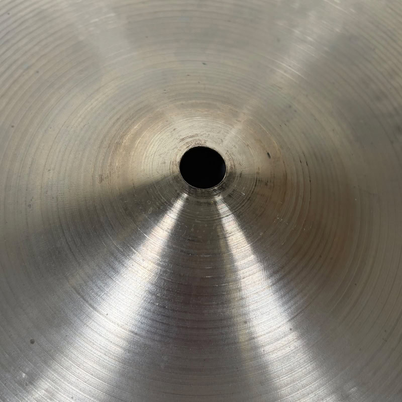 Close-up of a Zildjian 16-inch medium thin crash cymbal surface.