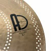 Close-up of Agen cymbal with perforations and logo.