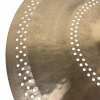 Close-up of a Zildjian 16-inch medium thin crash cymbal with perforations.