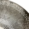A close-up of a Ride cymbal with perforations and the word 'RIDE' engraved.