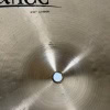 Close-up of Meinl Byzance 20in China cymbal surface with detailed grooves.