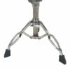 Stagg snare drum stand with adjustable legs and rubber feet for stability.