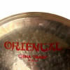 Close-up of Zildjian Oriental 14in China Trash Cymbal with red logo.