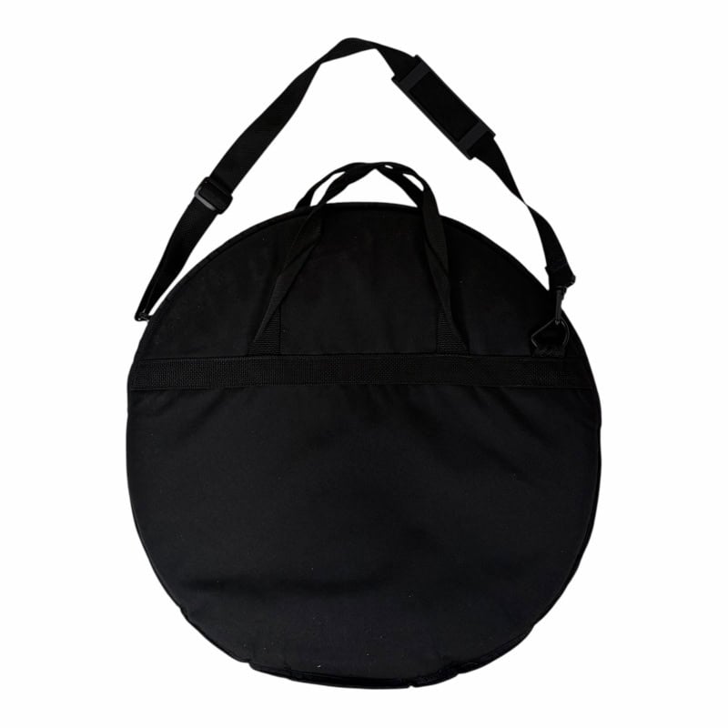 Black round cymbal bag with shoulder strap for drummers.