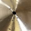 Close-up of a Zildjian K Constantinople 20-inch ride cymbal with patina and holes.