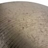 Close-up of Sabian B8 Ride cymbal showing wear and scratches.