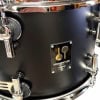 Close-up of Sonor Momentum 22-inch shell with hardware details.