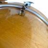 Close-up of Yamaha Maple Custom drum shell with hardware.