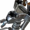 Close-up of Yamaha drum hardware part with logo and metal finish.
