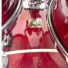 Close-up of Gretsch Renown 22-inch shell pack in red finish.