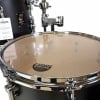 Close-up of Sonor Momentum 14-inch snare drum with chrome finish.