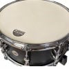 Close-up of Sonor Momentum snare drum with black finish and chrome hardware.
