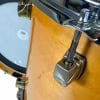 Close-up of Yamaha Maple Custom drum shell with tuning hardware.