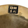 Close-up of Stagg DH 14in China cymbal with logo.