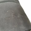 Close-up of a black drum case with minor scuffs and wear marks.