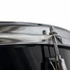 Close-up of snare drum tension rod and rim hardware.