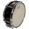 Black Remo snare drum with chrome hardware for drummers and percussionists.