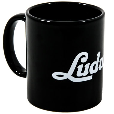 Black ceramic mug with 'Luda' logo for drummers and music fans.