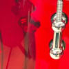 Close-up of red acrylic drum shell with chrome hardware from Drummers Only.
