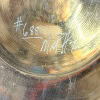 Close-up of Sabian Larrie Londin 21in limited edition ride cymbal with handwritten markings.