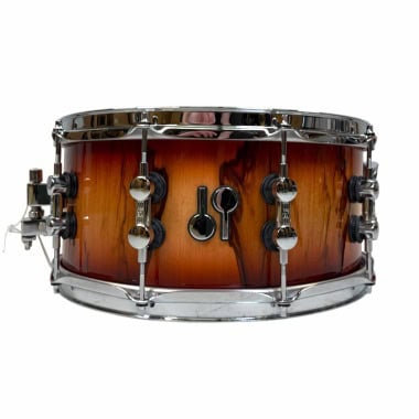 Sonor Sq2 snare drum with wooden finish and chrome hardware.