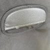 Close-up of bass drum case handle with wear and tear.