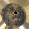 Used crash cymbal with visible tarnish and wear marks.
