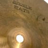 Close-up of Sabian AA 14-inch Sizzle Hats cymbals showing branding and surface details.