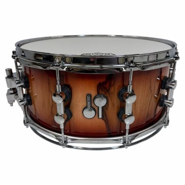 Sonor SQ2 snare drum in red burst finish with African marble accents.