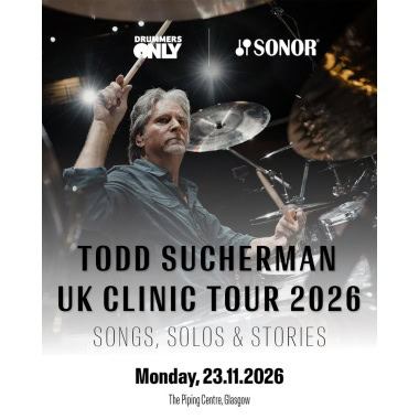 Todd Sucherman performing at UK drum clinic 2026 with drums and cymbals.