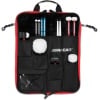 Drummers Only stick case with drumsticks, accessories, and storage compartments.