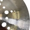 Close-up of Istanbul Agop 20in Ion China cymbal with reflections and holes.